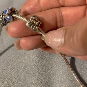 Sterling silver/ 14k yellow gold retired charm.